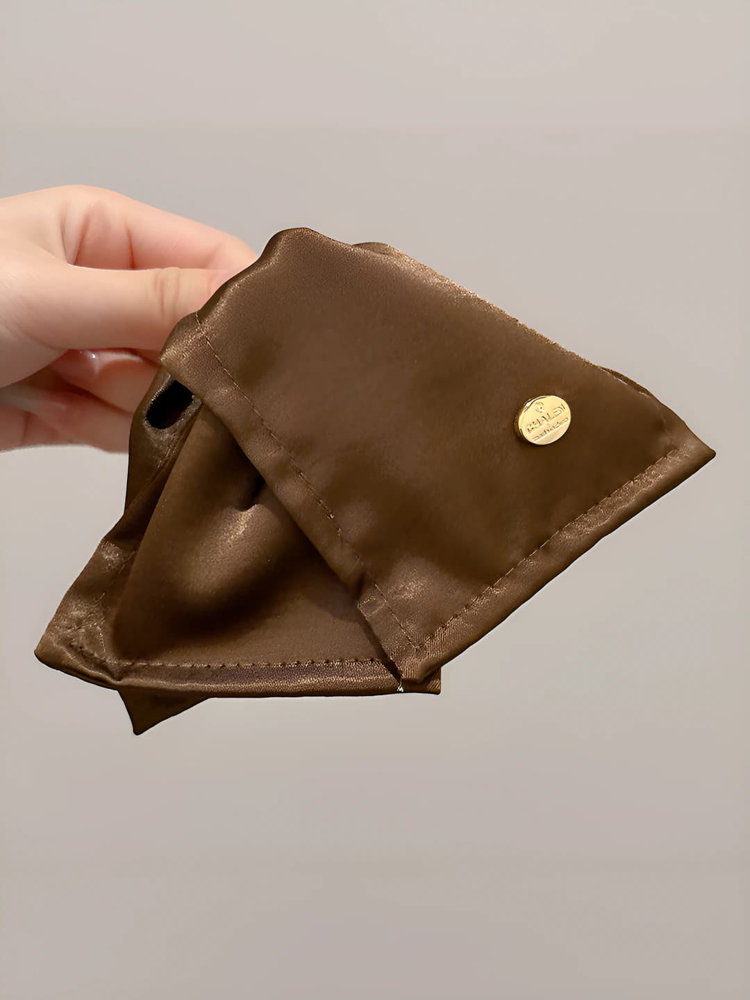 Dark brown ~13 cm