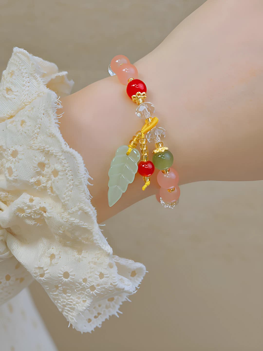 Pink beads and leaf
