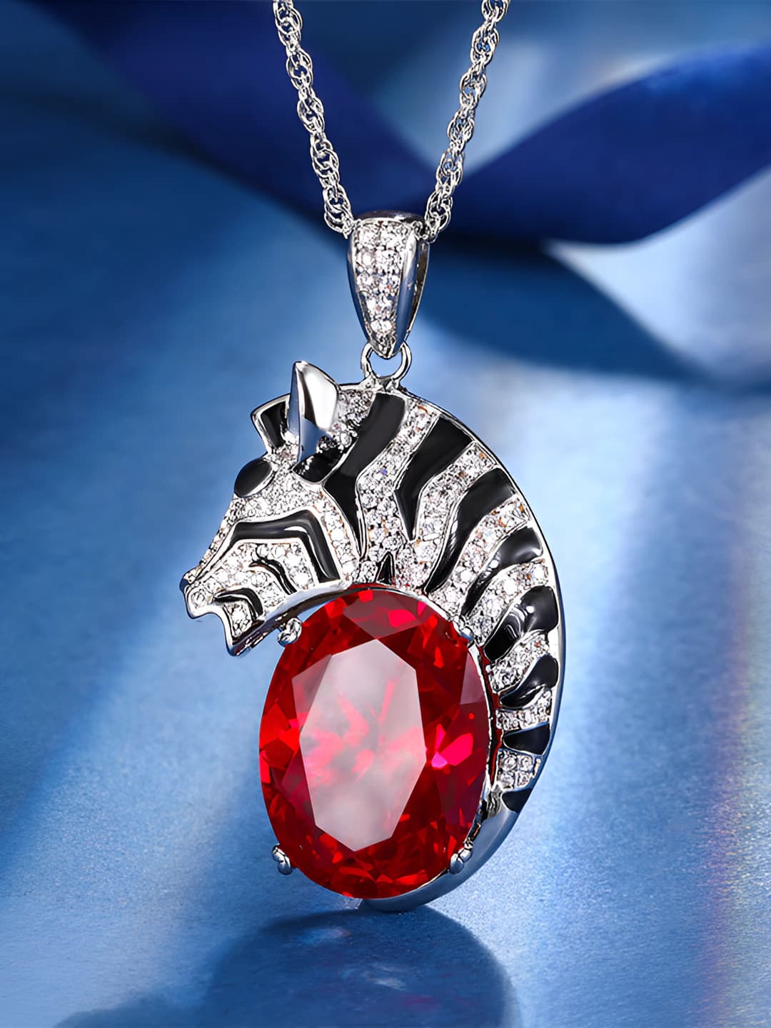 Red ruby pendant with chain