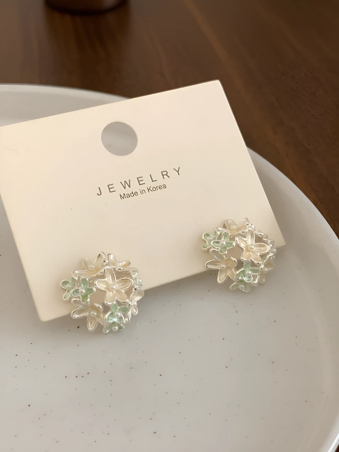 White large floral earrings
