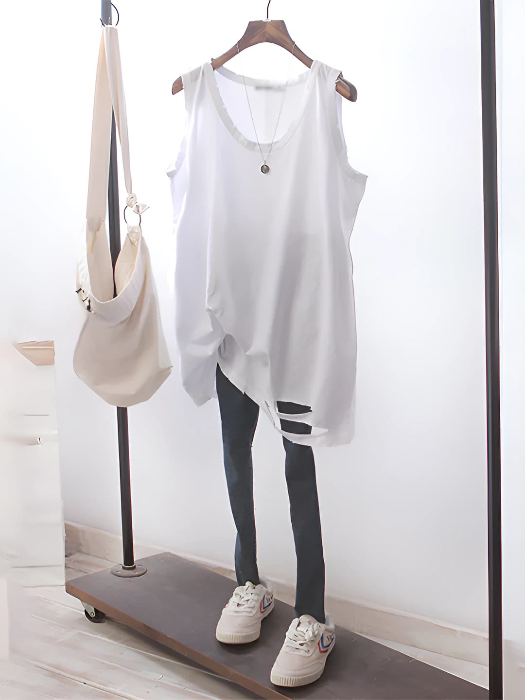 Women's mid-length sleeveless tank top with crew neck, casual style, white, distressed, all-season