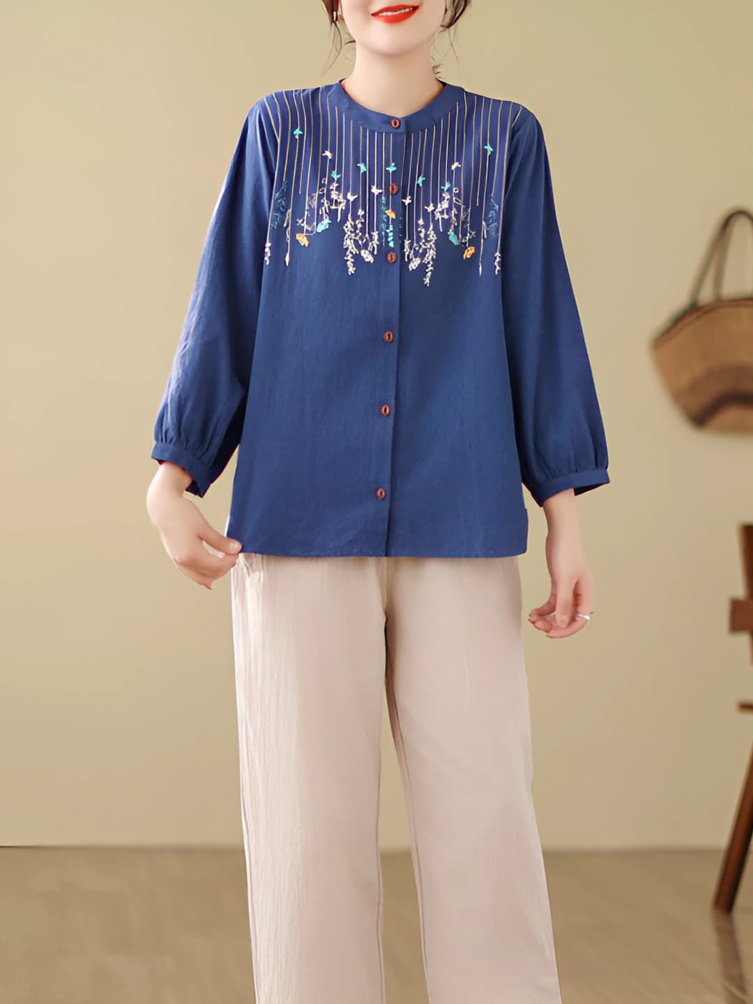 Dark blue top + khaki cropped pants