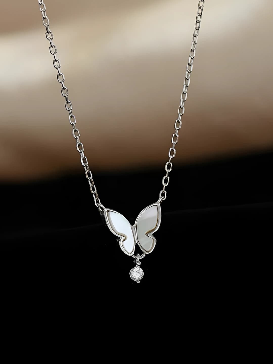 Women's white mother-of-pearl teardrop and butterfly pendant chain necklace