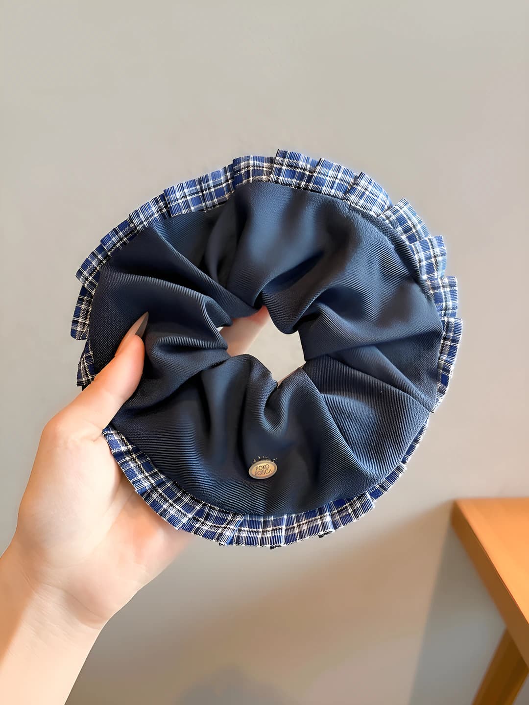 Blue scrunchie, plaid edge