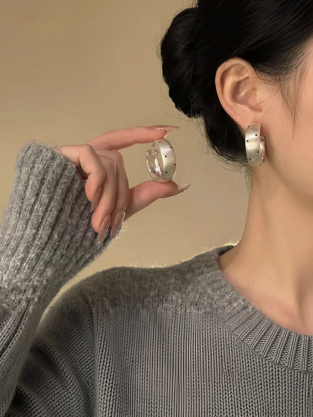 Silver brushed black dot earrings