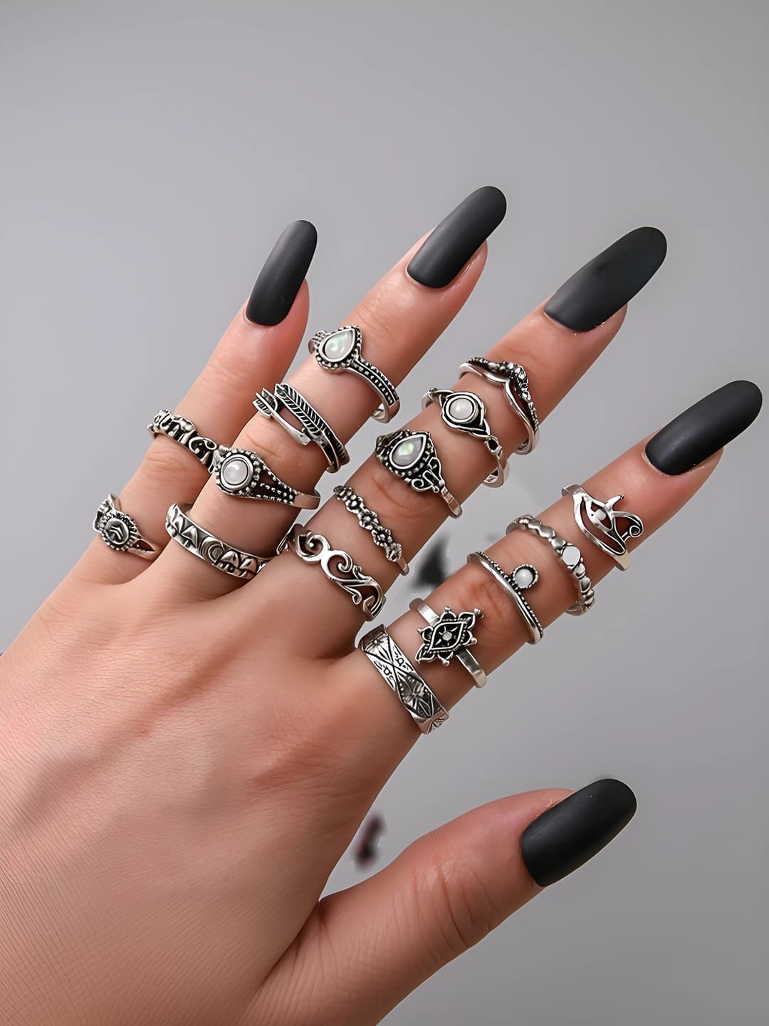 Women's 16-piece ring set in retro style with silver embossed elephant, moon, wave and eye designs