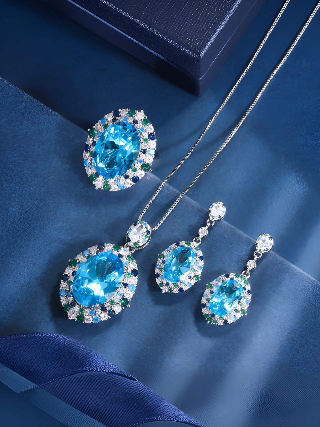 Women's set with simulated aquamarine on gold-plated copper base, oval main stone 13*18, 8*12