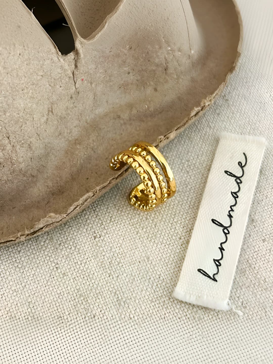 Oltin quloq klipsi