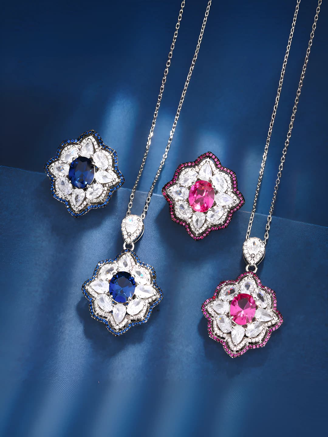 Women's geometric pattern set with gold-plated copper base, simulated red ruby and blue spinel stones, in black and gold color scheme
