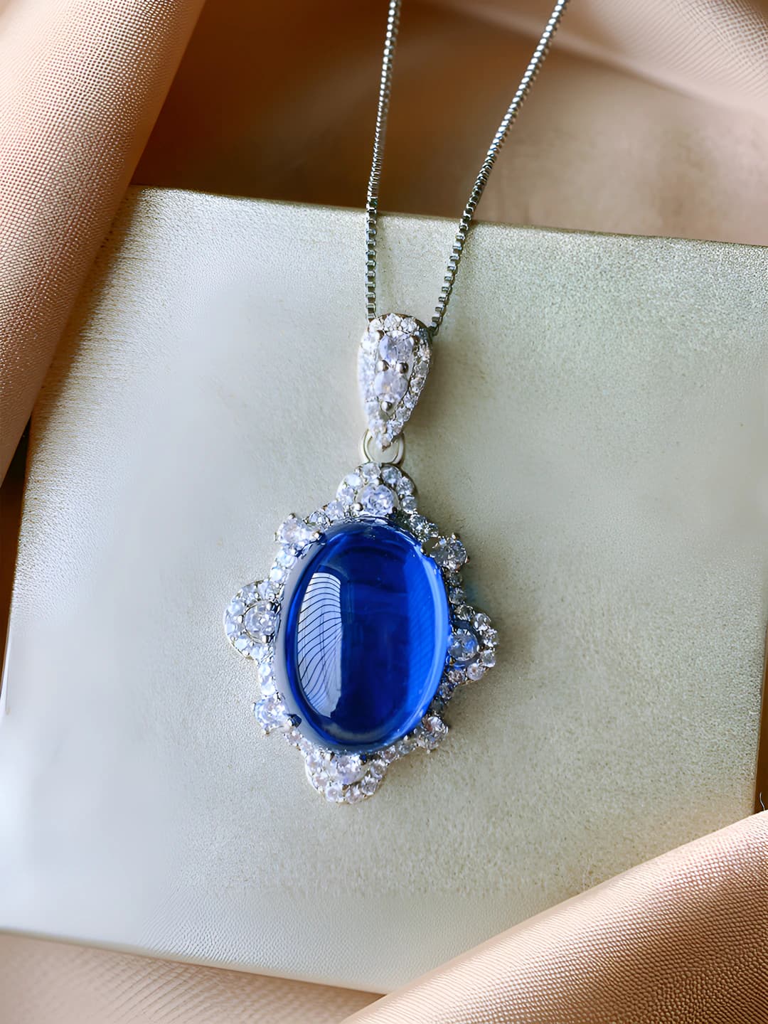 Blue spinel pendant with chain