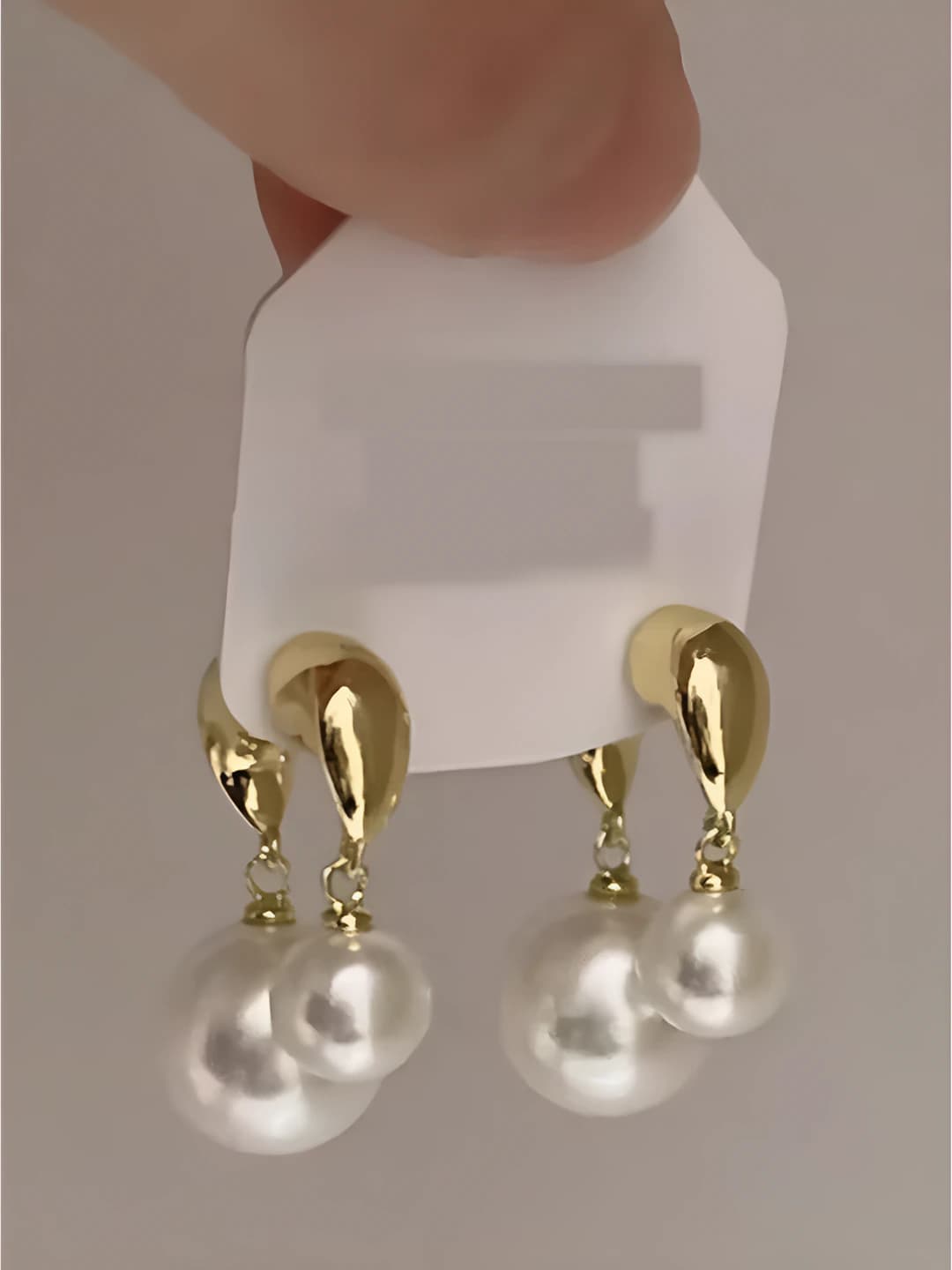 Gold pearl earrings