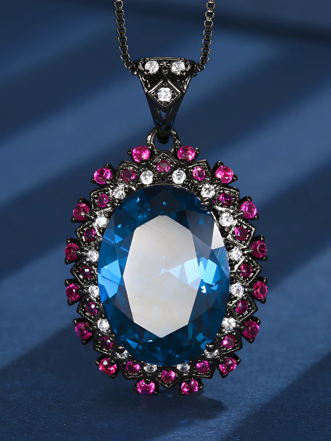 Black-gold blue spinel, box