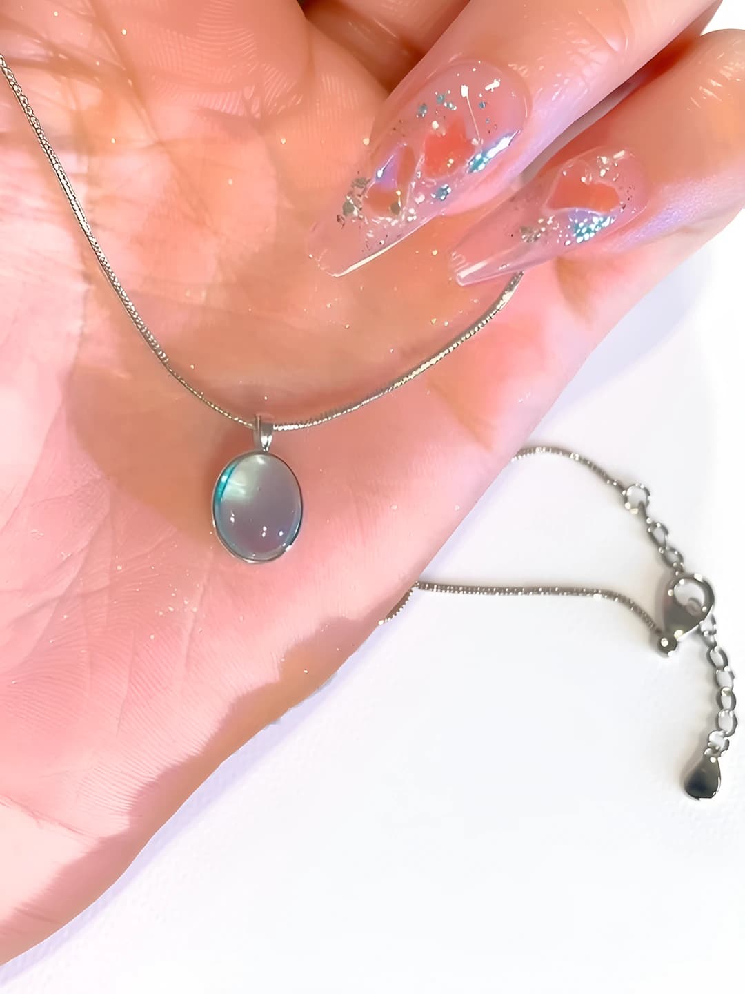 Women's silver-tone collarbone chain necklace with oval sapphire pendant
