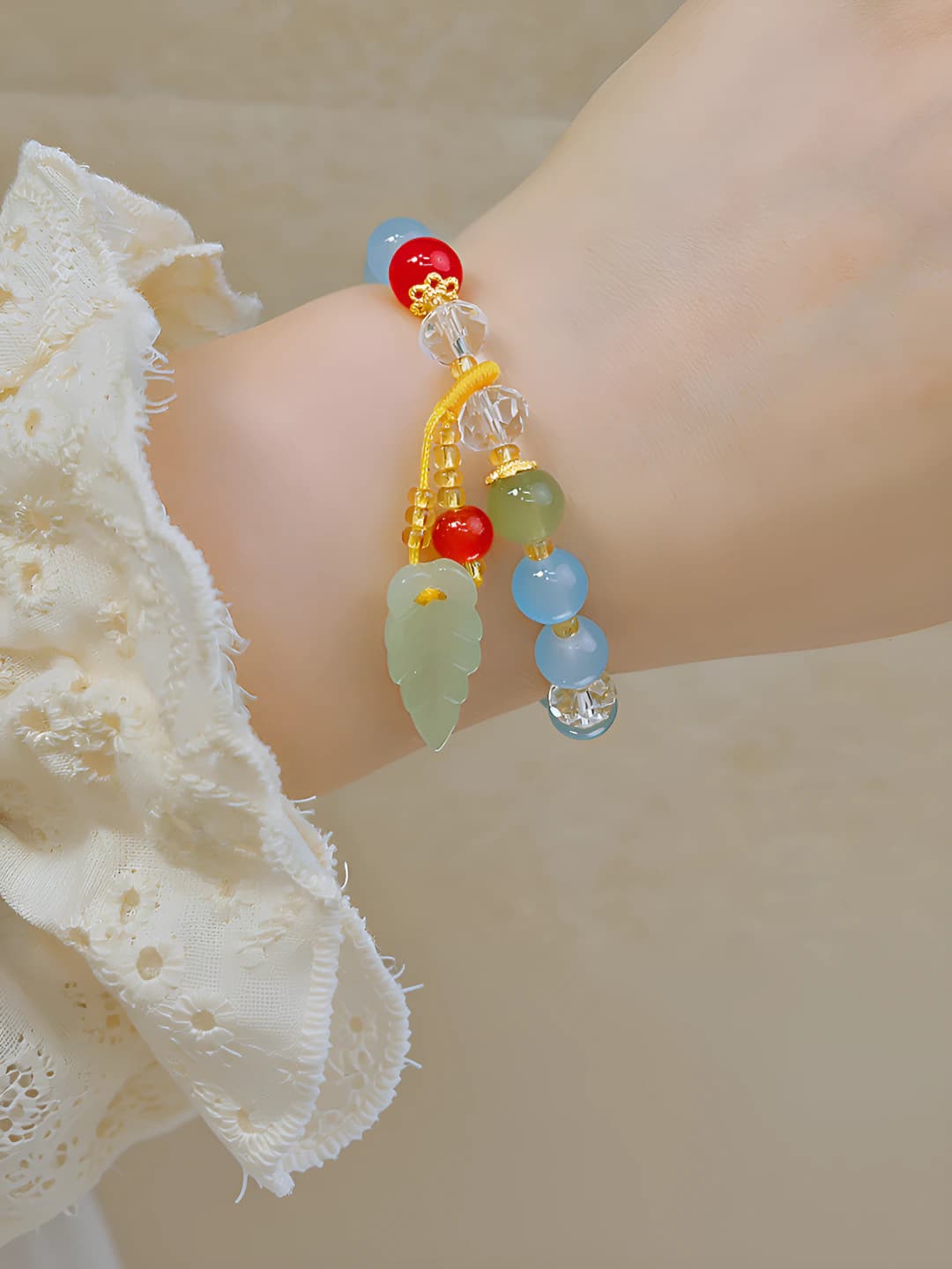 Blue beads and leaf