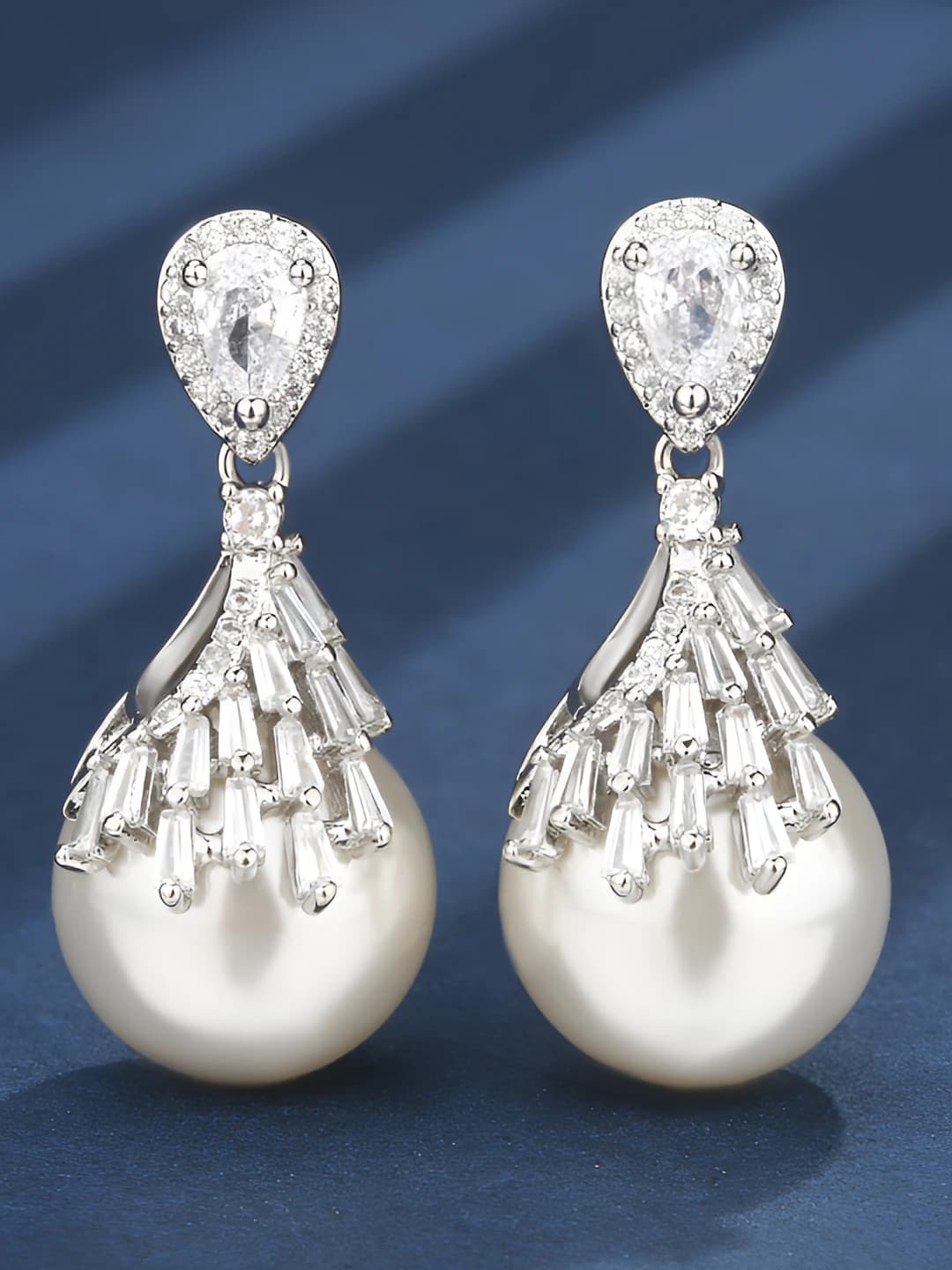 White pearl stud earrings