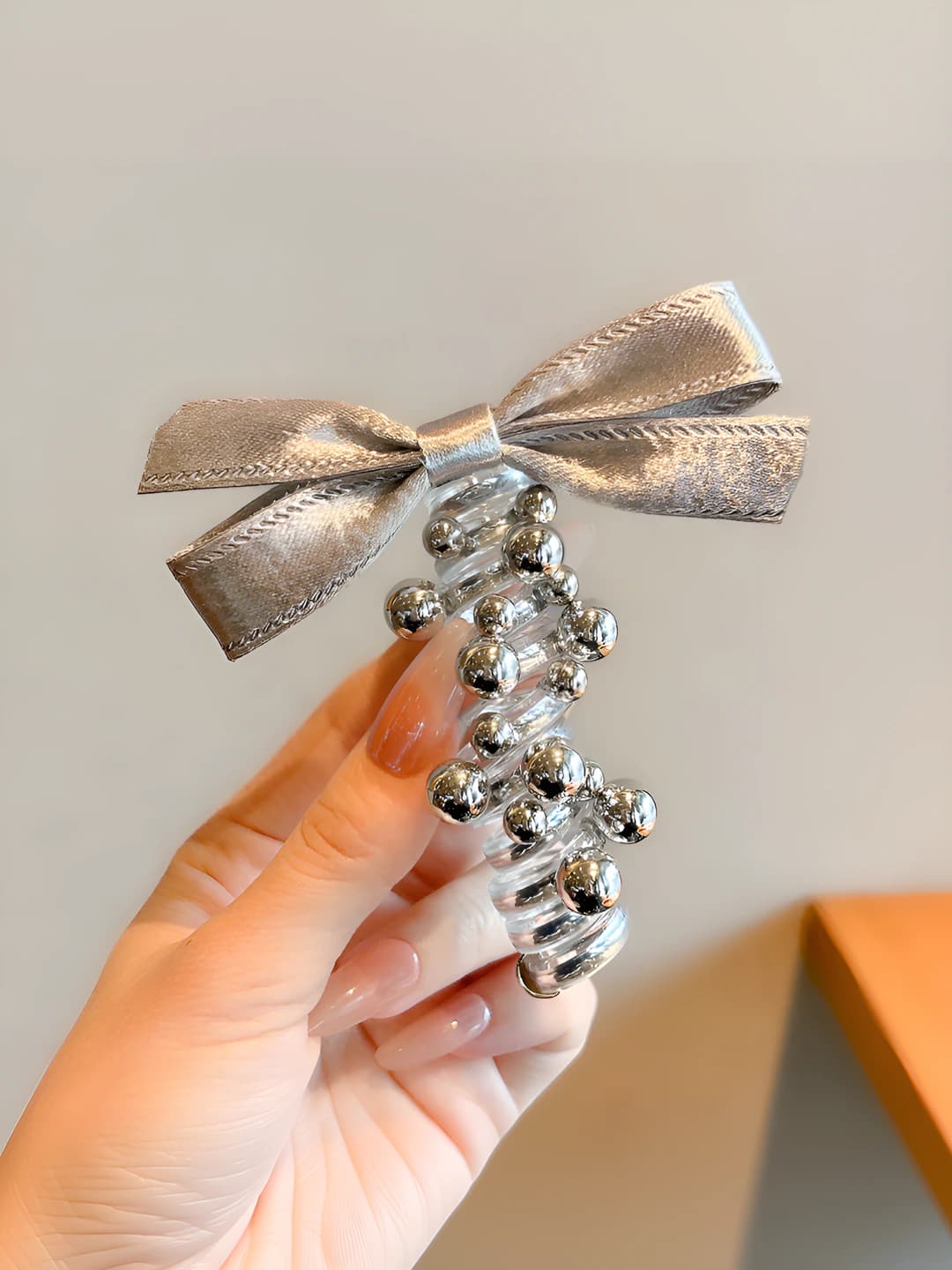 2# Small bow phone cord hair tie