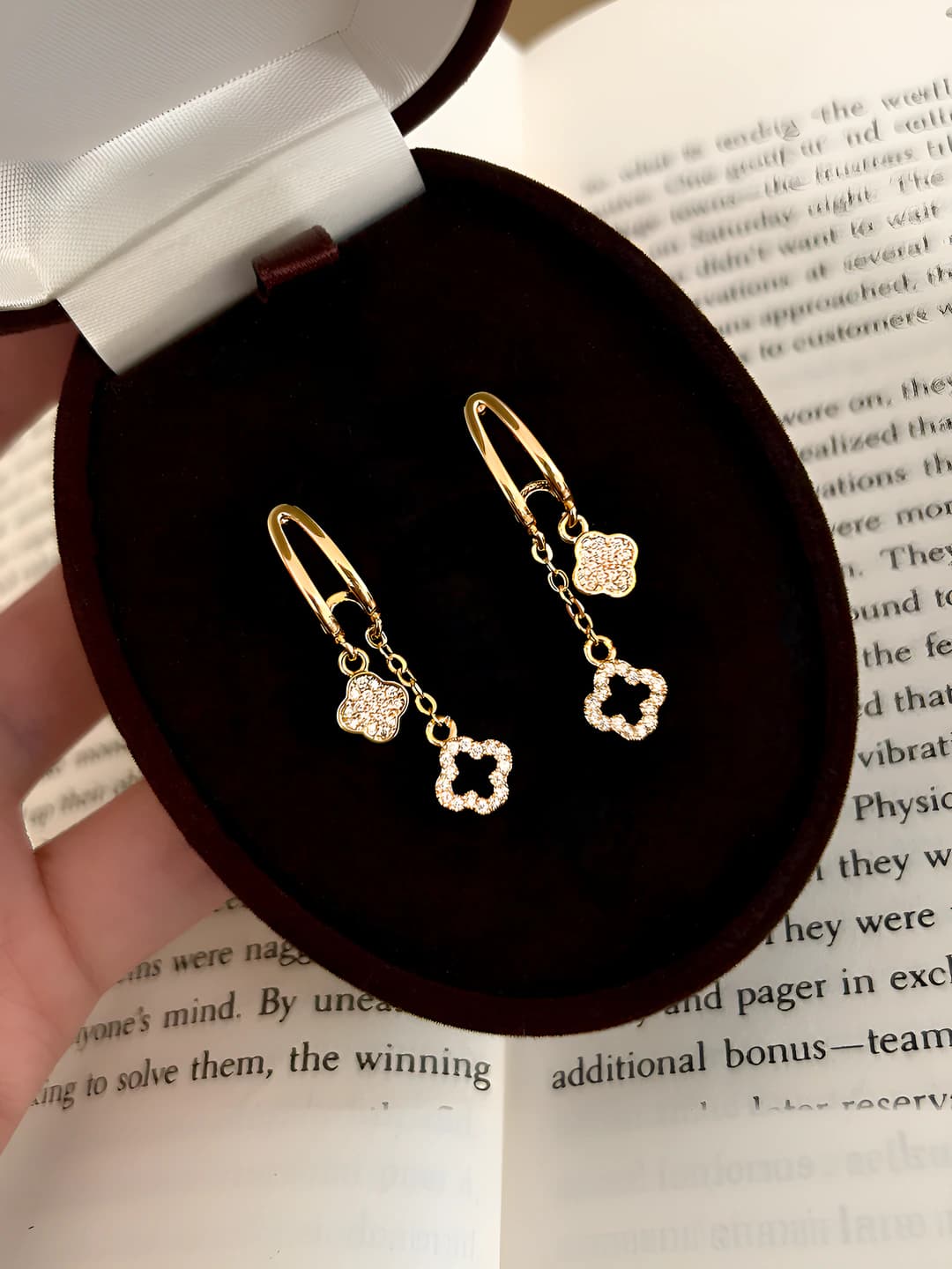 Gold four-leaf clover studs