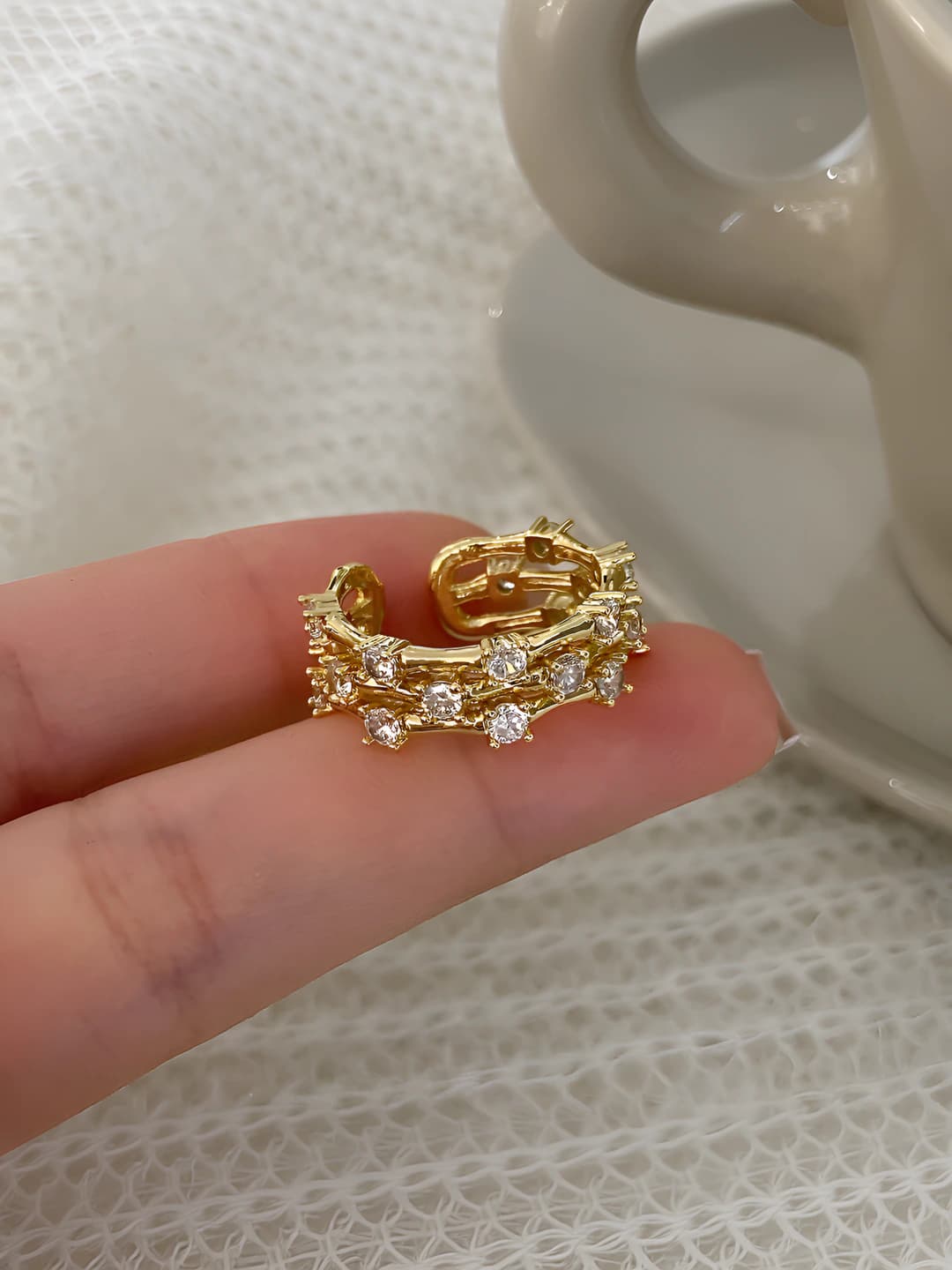 Gold sparkling zircon triple ring