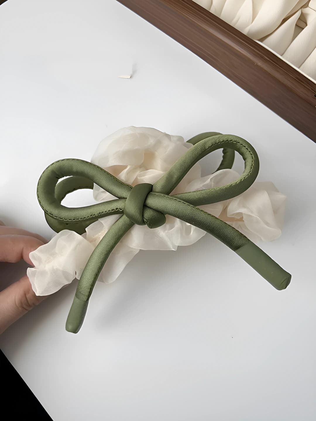 Green bow clip