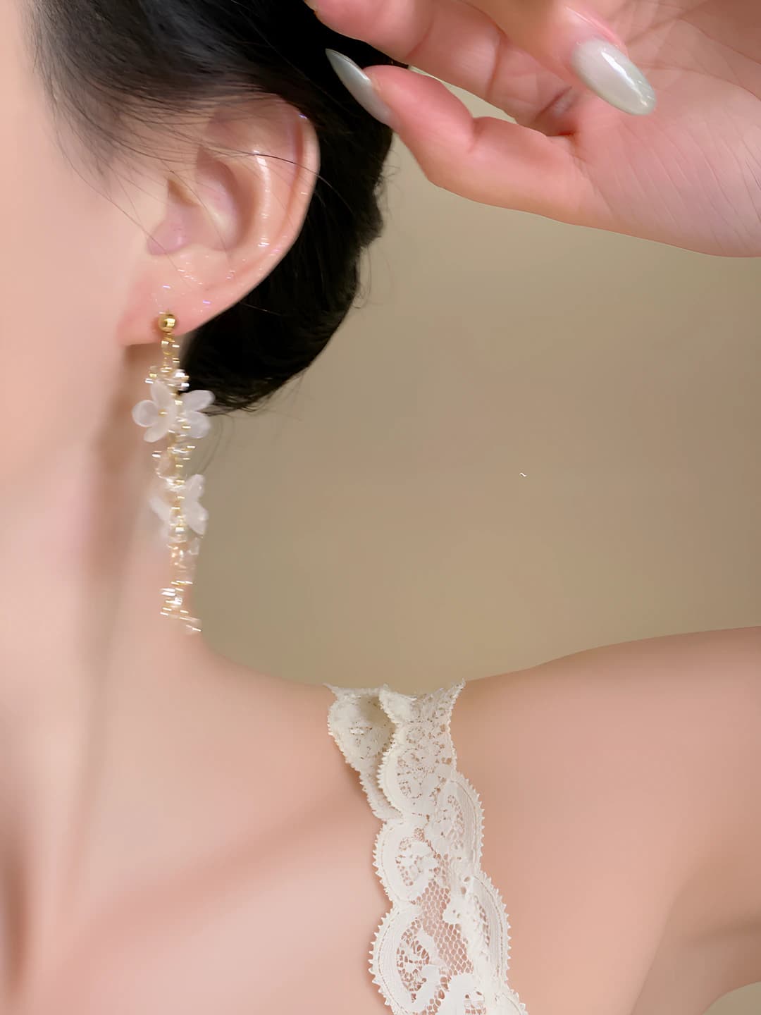 White flower, gold chain, earrings