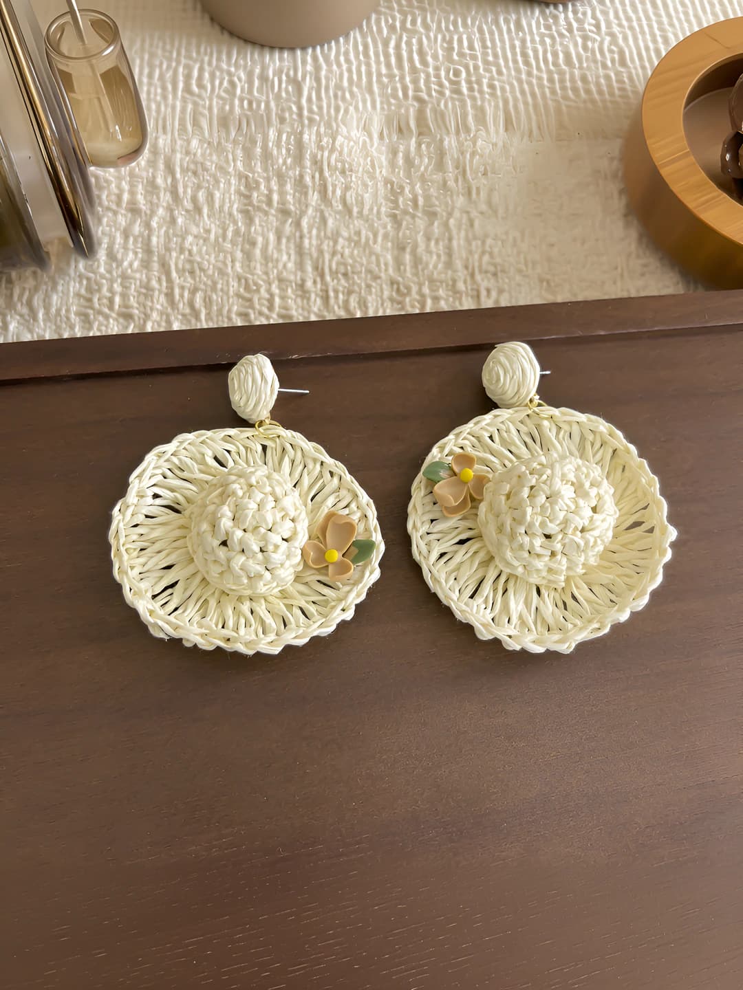 White woven hat-shaped stud earrings