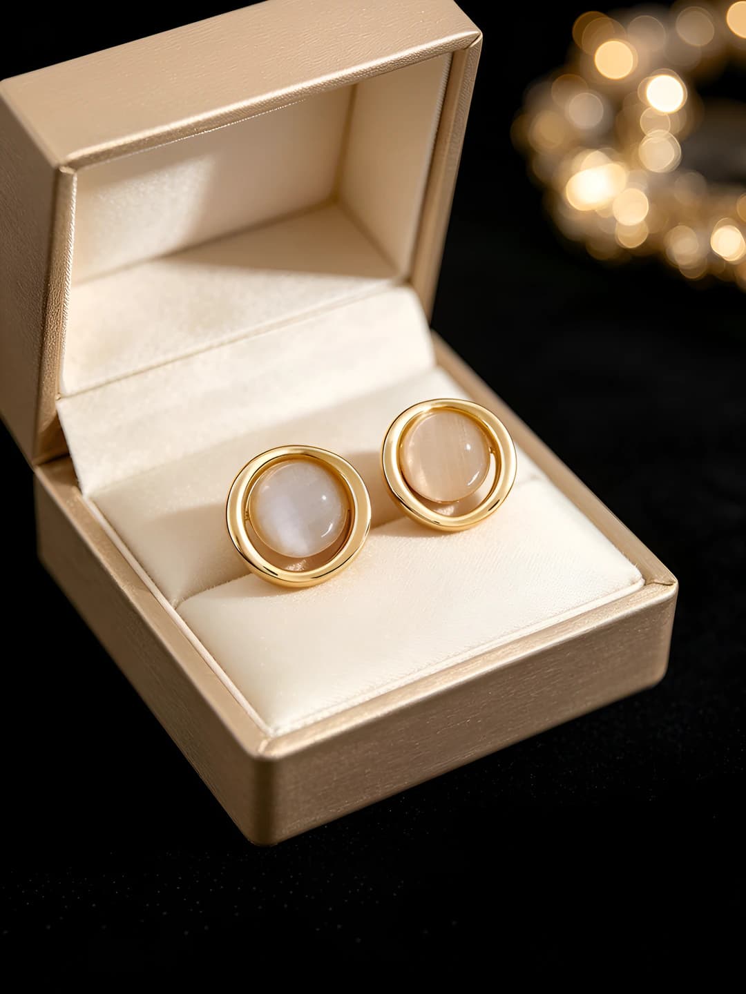 1# White cat's eye studs