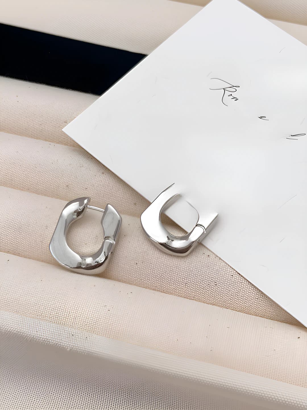 Silver U-shaped earrings