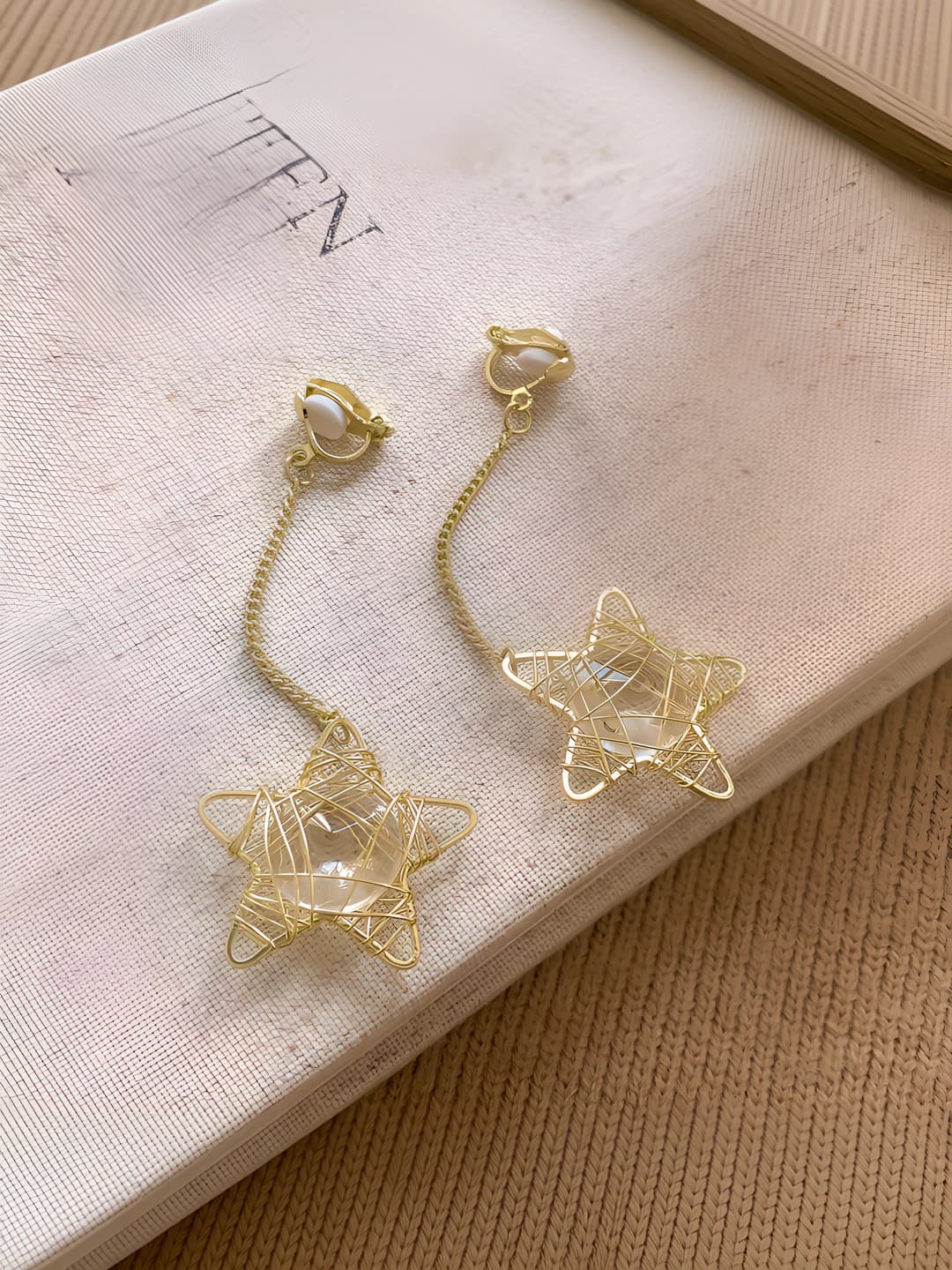 10# gold - cord wrapped star ear clip