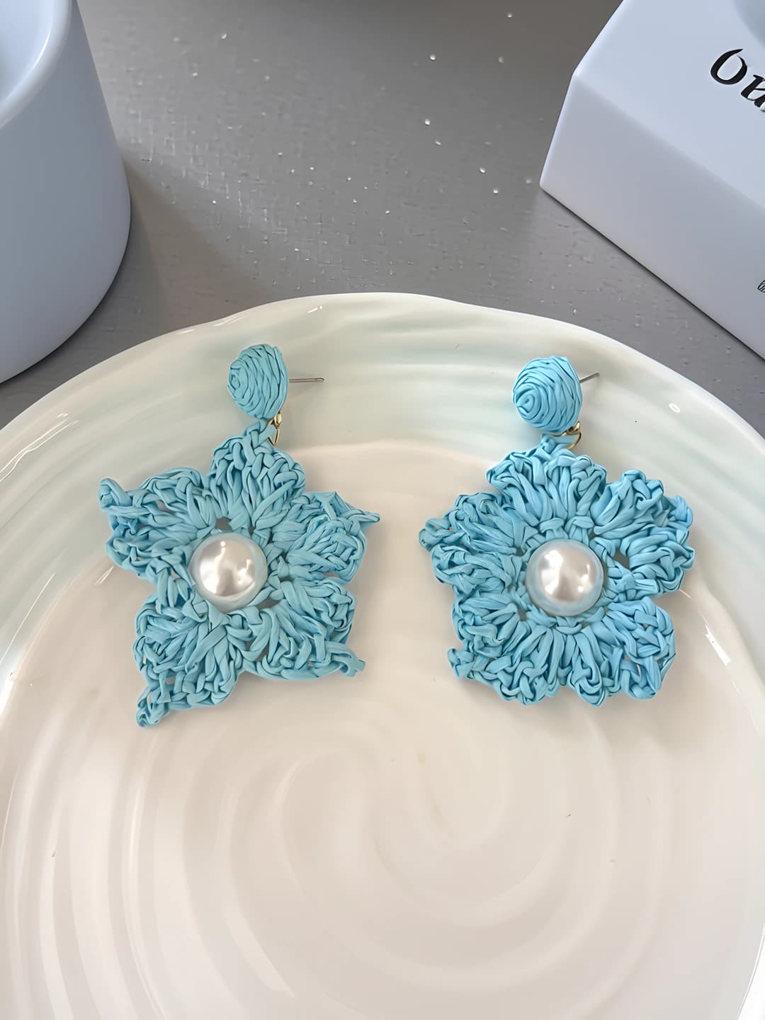 Blue woven pearl star studs - 925 silver