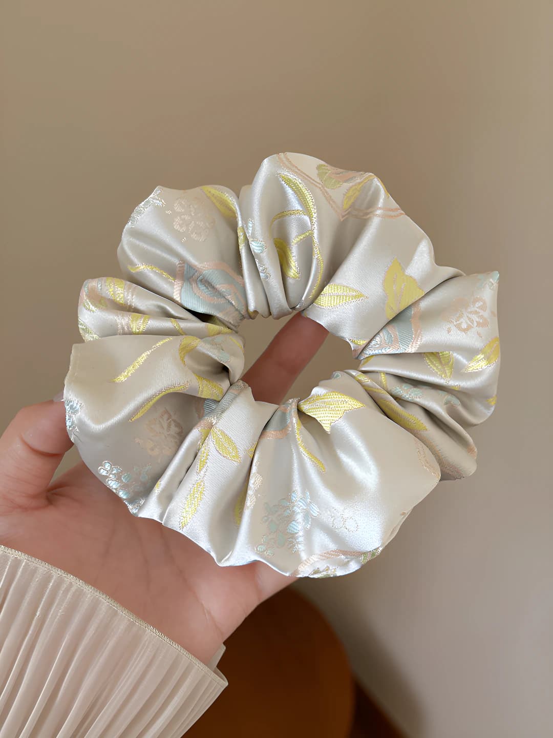 Yellow embroidered hair tie