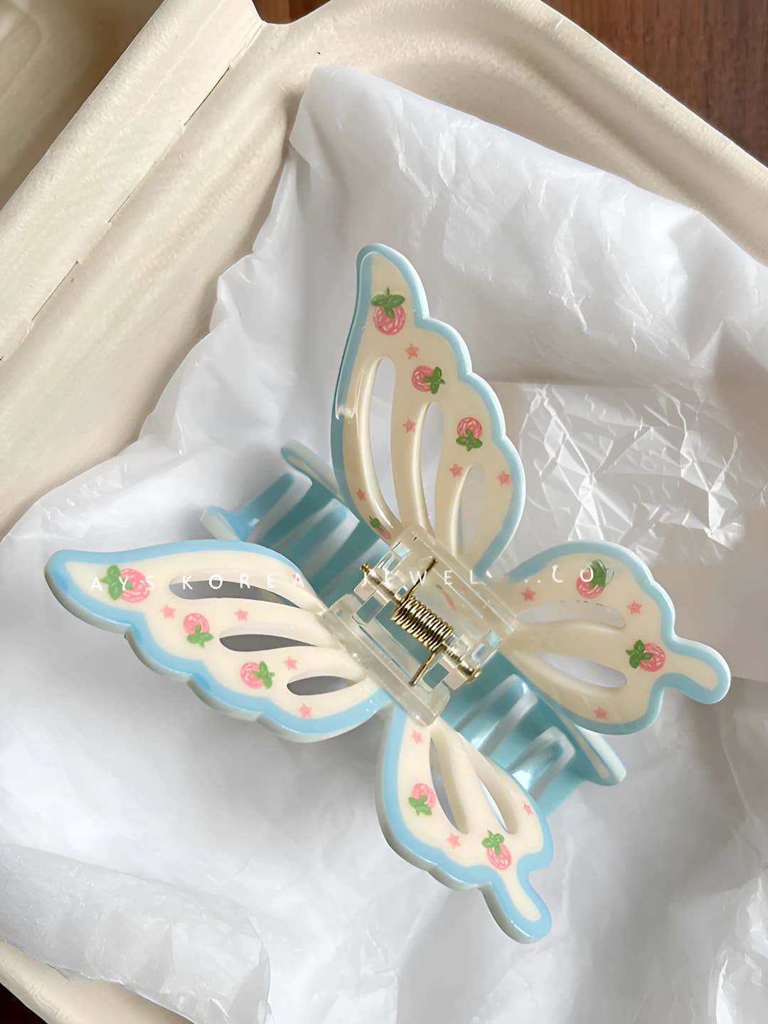 Blue-white cutout bow