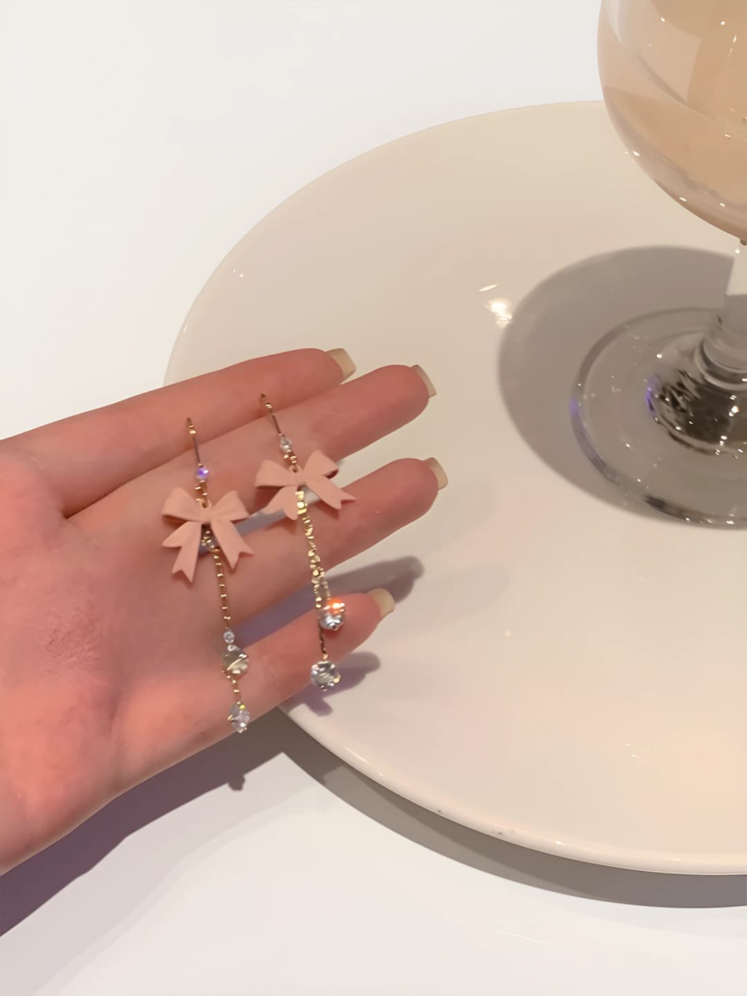 Women's bow tassel dangle earrings in Korean style
