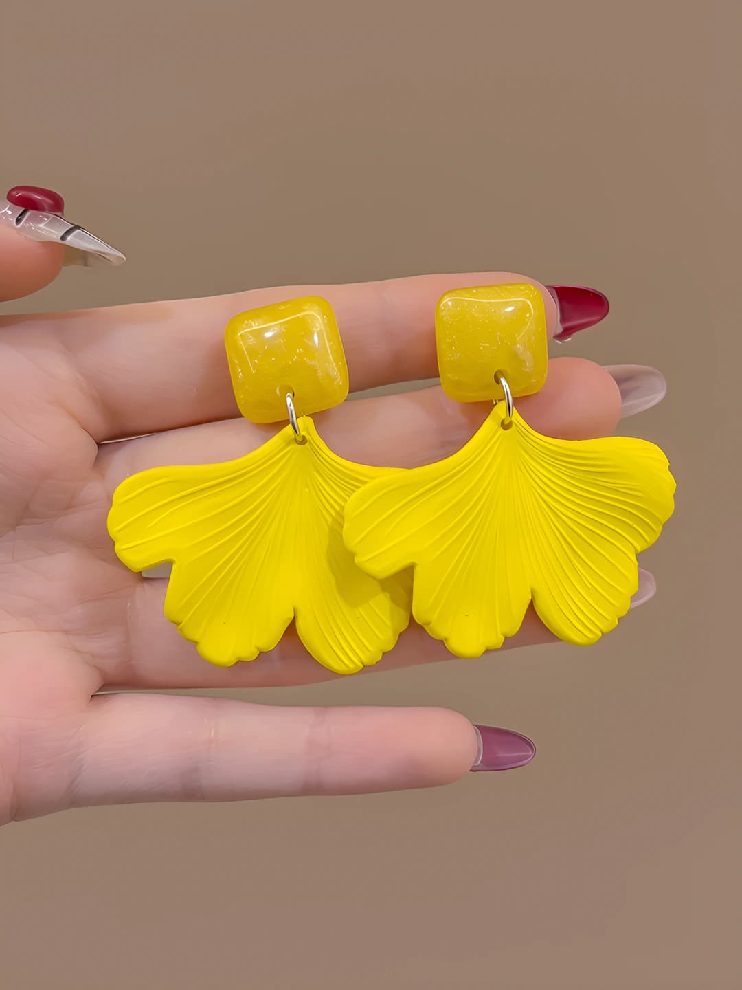 Yellow maple leaf clip-on earrings