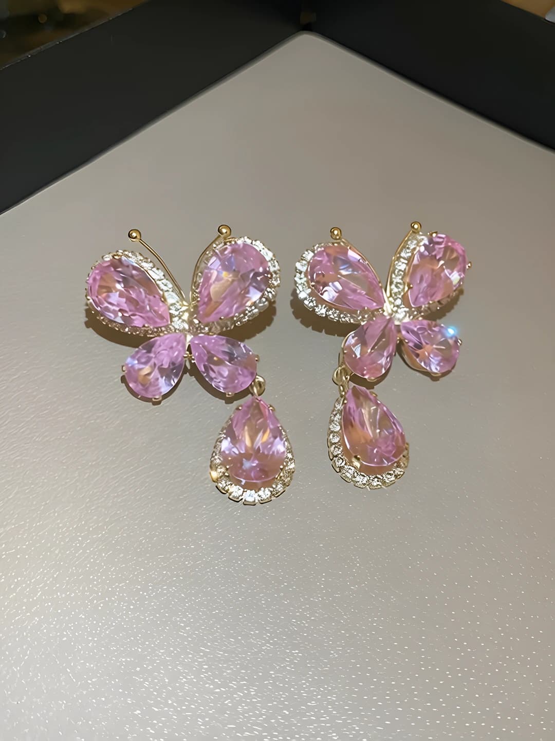 84# Silver post - Pink zircon butterfly