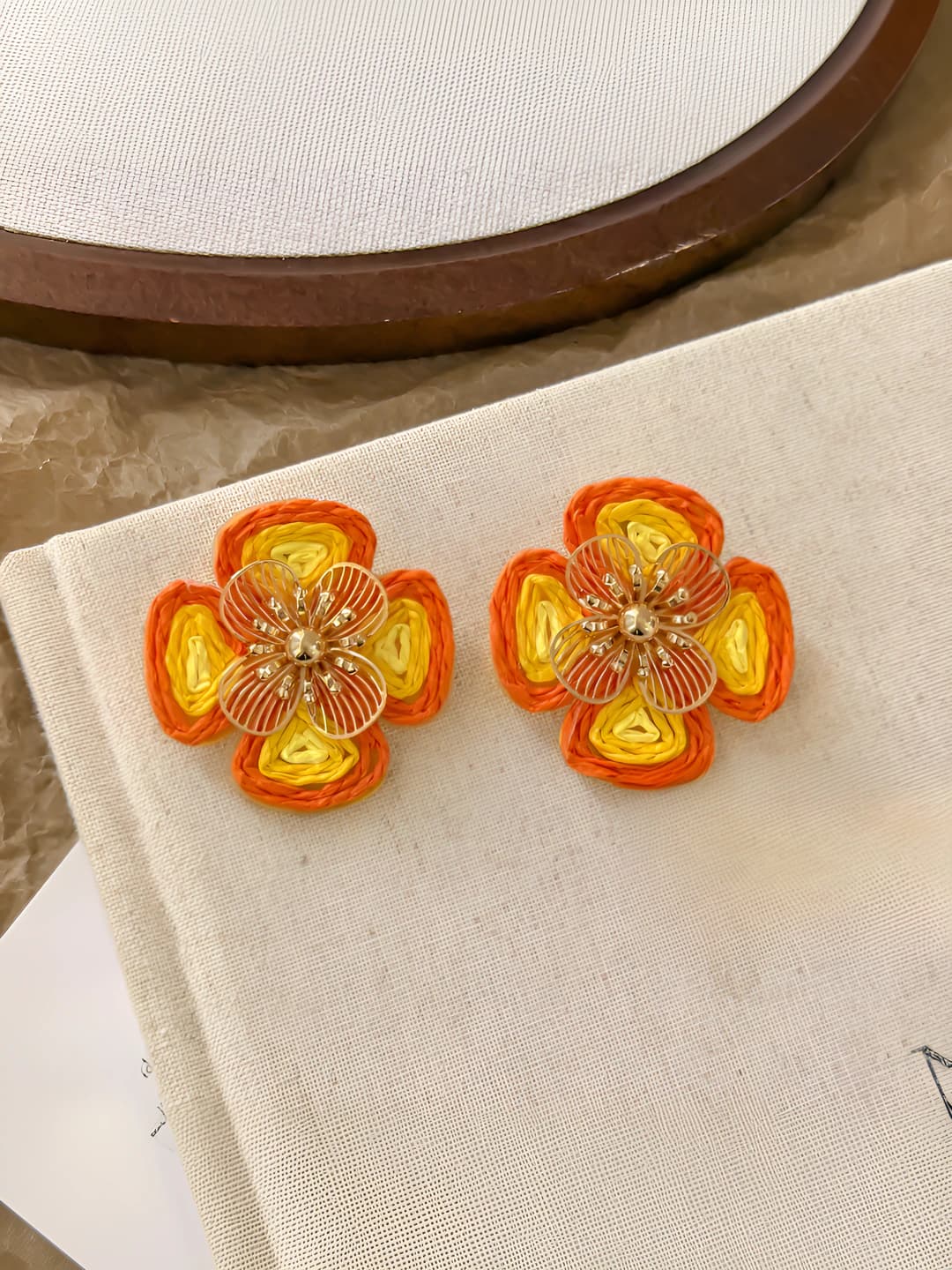 Orange four-leaf clover stud