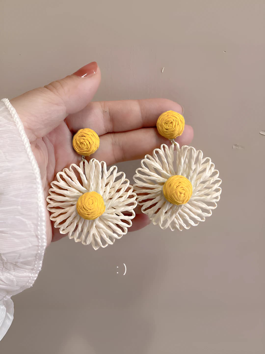 Beige sunflower studs
