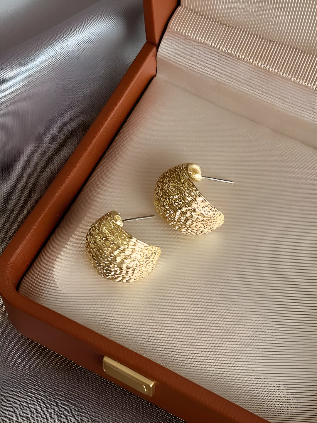 Gold crumpled ball earrings