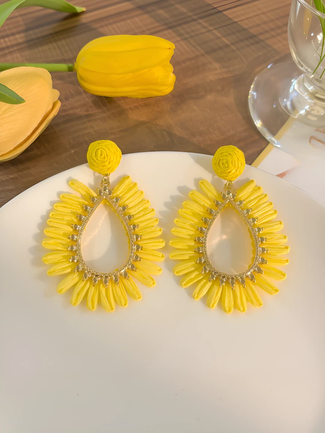 Yellow openwork woven stud earrings