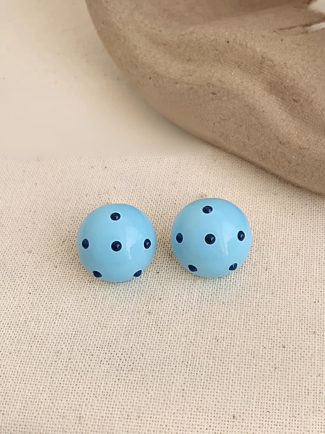 Blue polka dot round studs