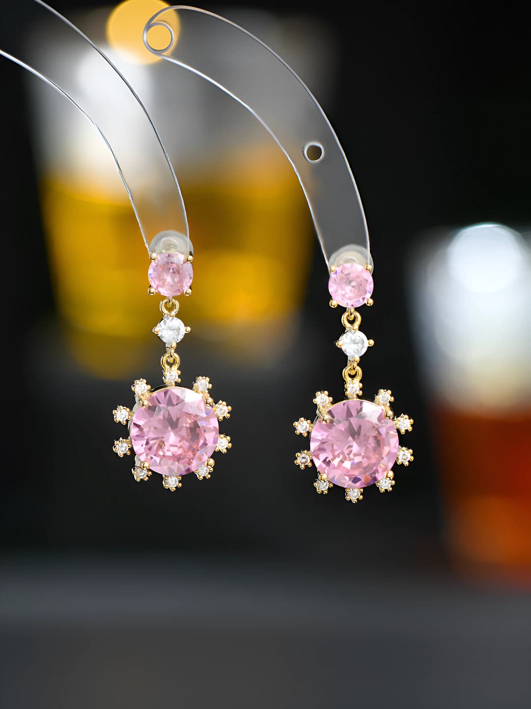 Women's silver stud earrings with snowflake geometric design