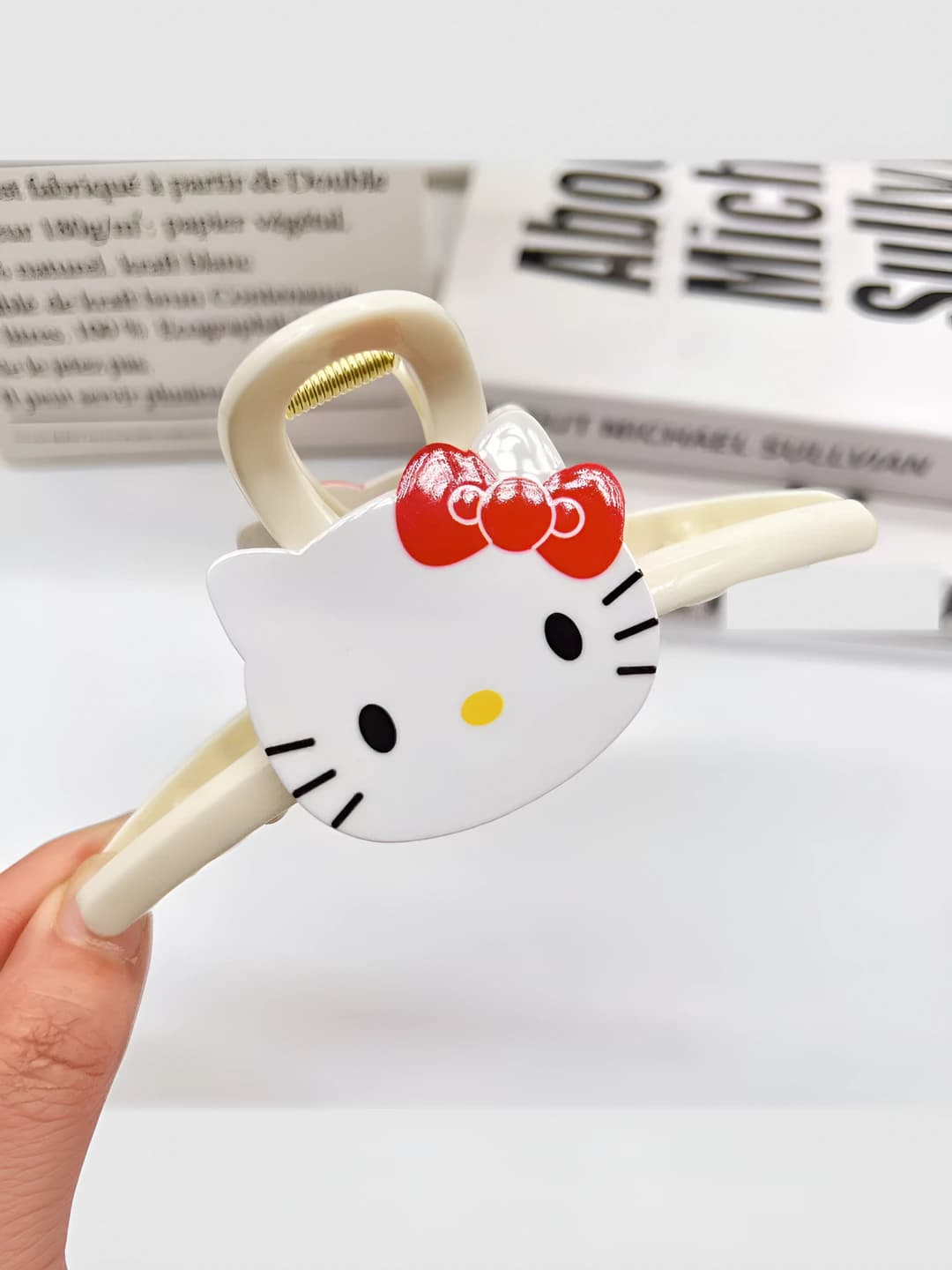 White cat hair clip