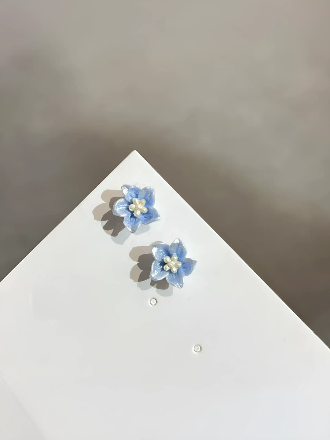Blue floral magnetic ear clips pair