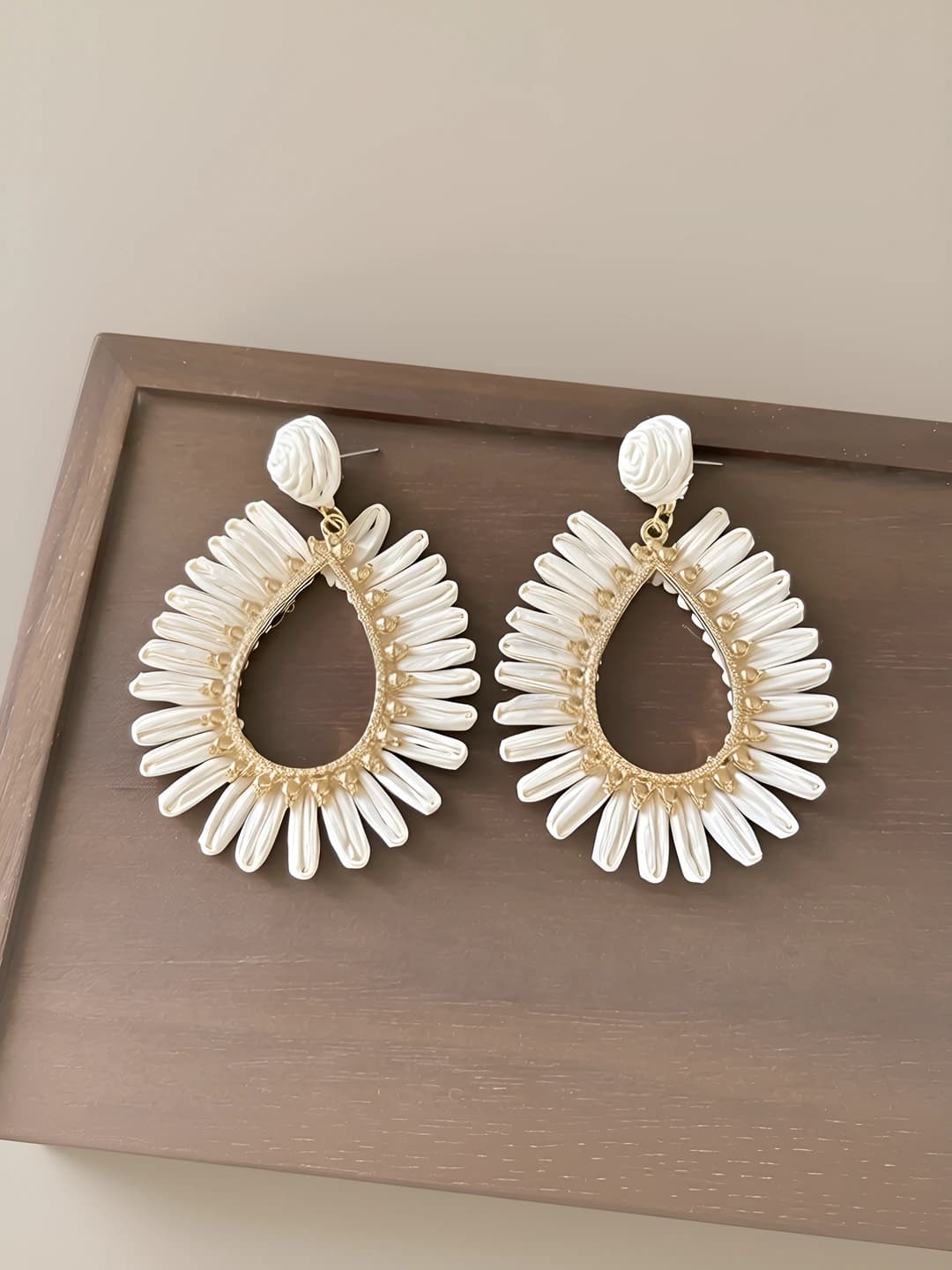 White openwork woven stud earrings