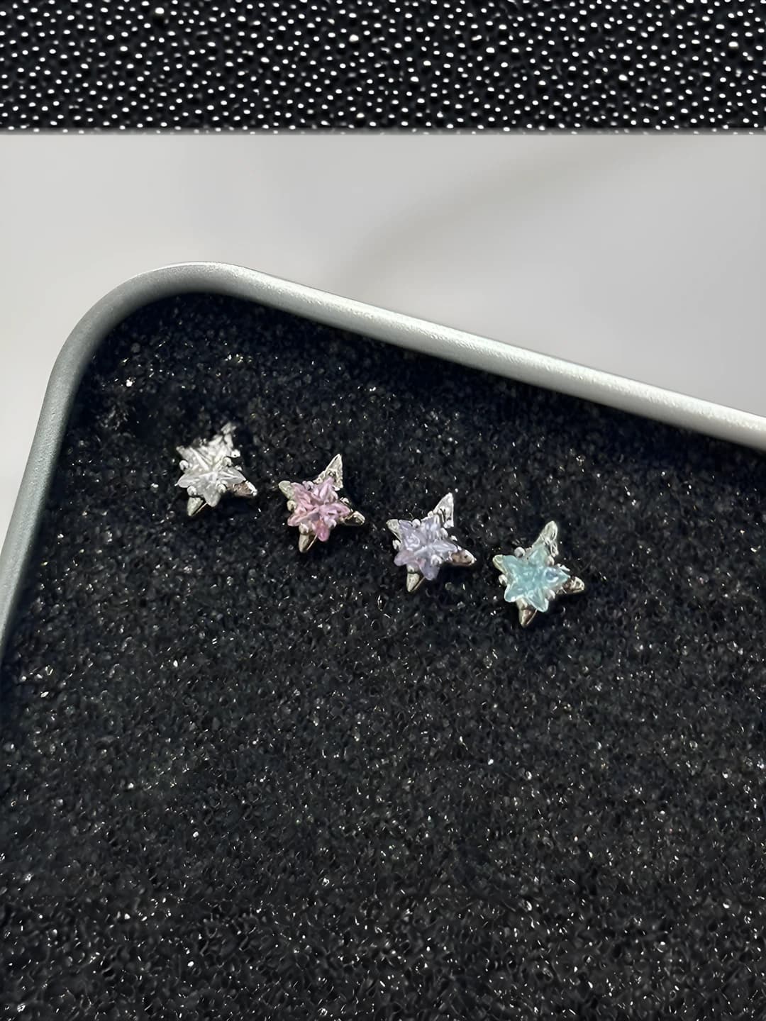 Blue 4-point star titanium 1 pc