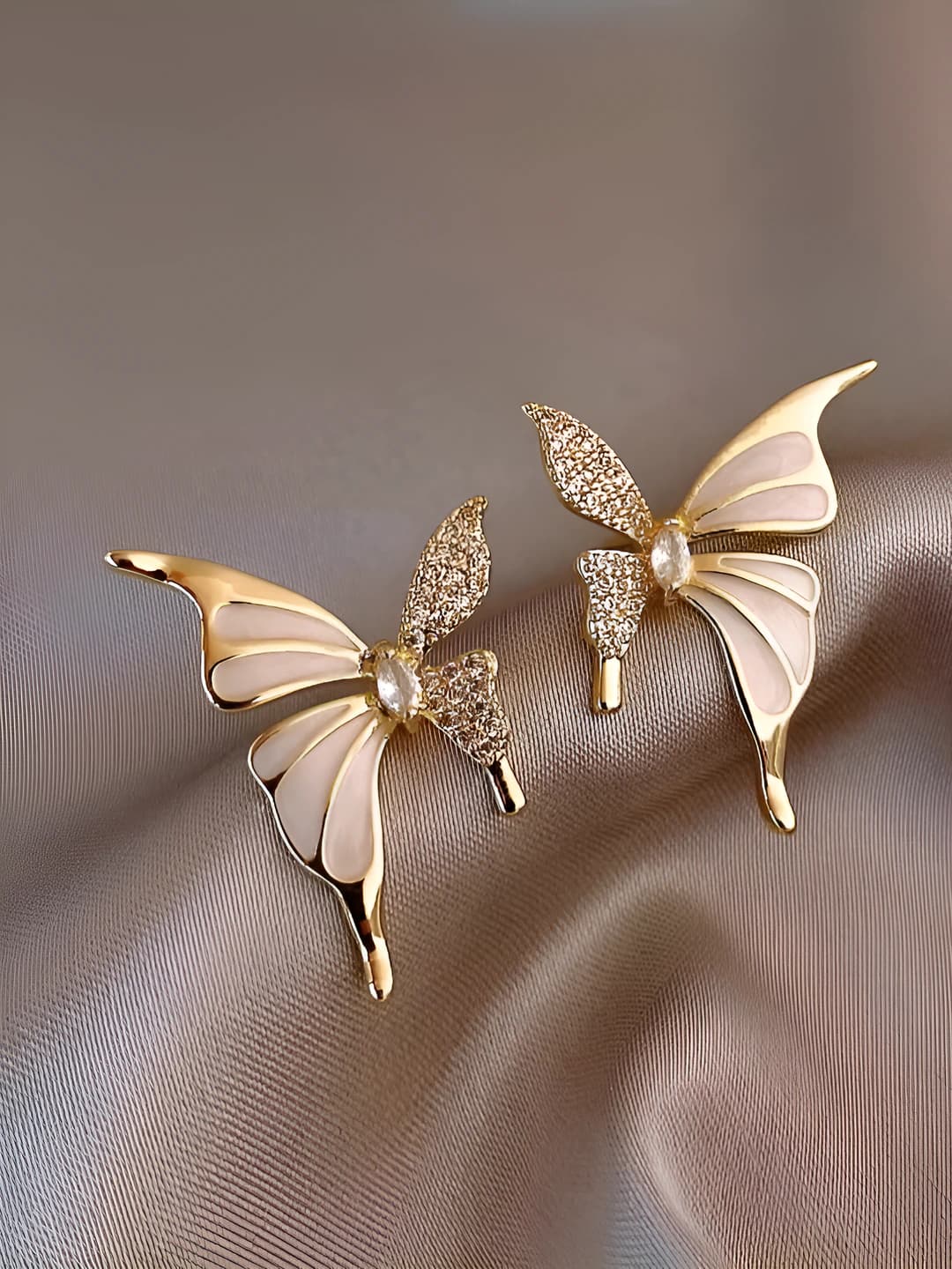 Zircon butterfly stud