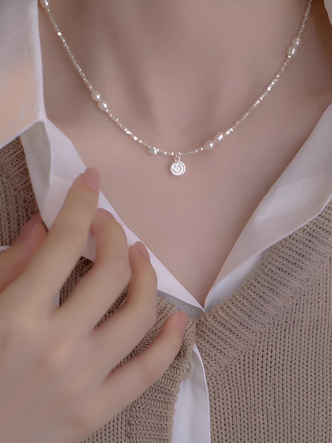 Smiley face pearl and silver necklace