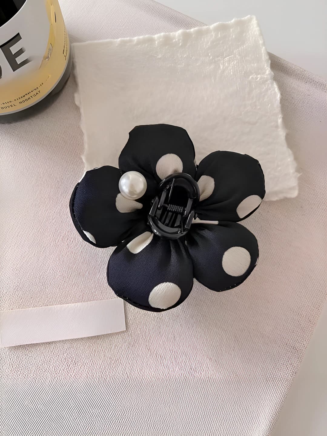 Black polka dot hair clip