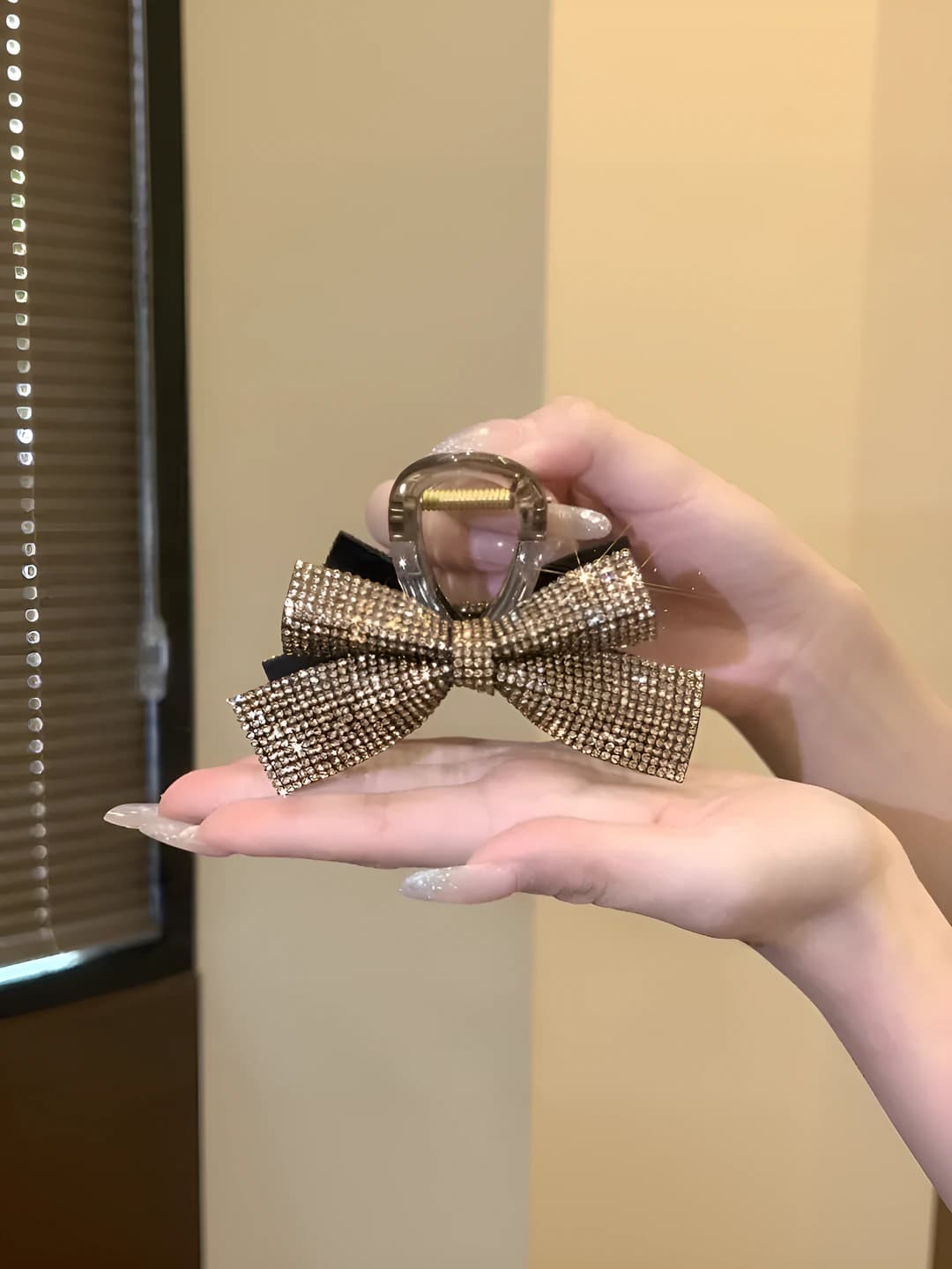 Champagne rhinestone bow clip