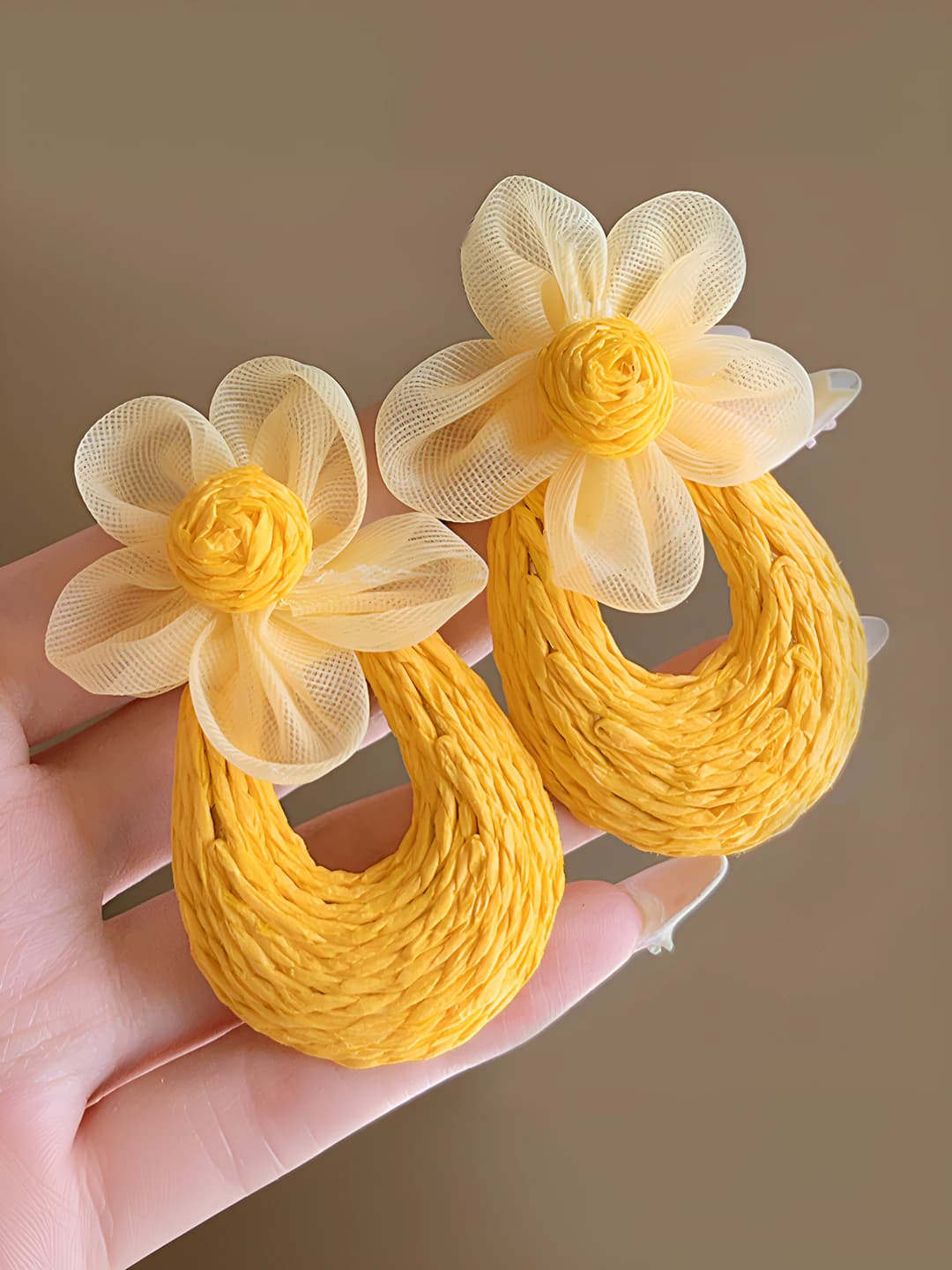 Yellow woven flower hoop earrings