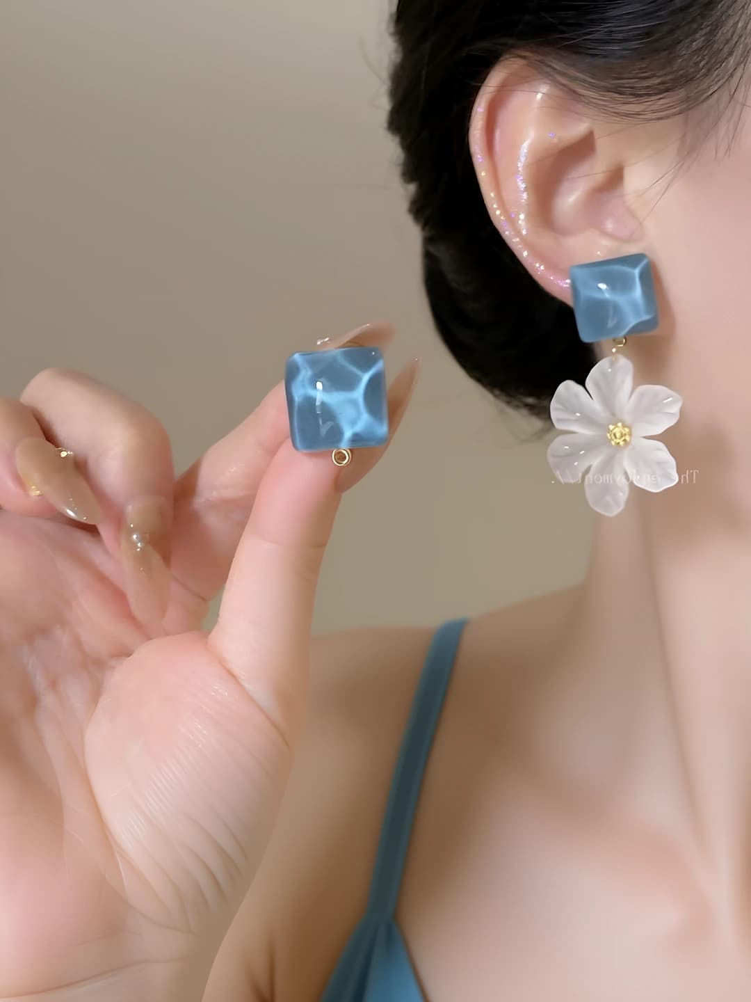 Blue cubic floral earrings
